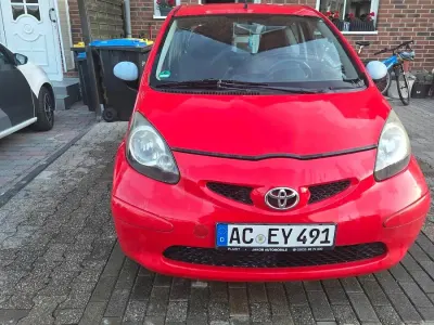 Gebraucht Toyota Aygo 69 PS (50 kW) 2007 Rot Kleinwagen