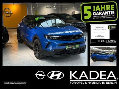 Gebraucht Opel Mokka-e GS Line 100 kW (136 PS) 2023 Perl blau/voltaik blau (metallic) SUV