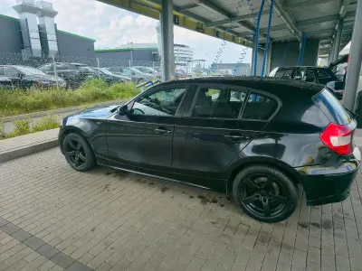 Usata BMW 118 122 CV (89 kW) 2006 Nero Utilitaria