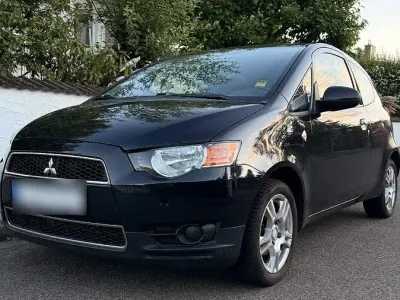 Gebraucht Mitsubishi Colt Invite 95 PS (69 kW) 2011 Schwarz Kleinwagen