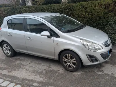 Gebraucht Opel Corsa Active 87 PS (63 kW) 2013 Silber Kleinwagen