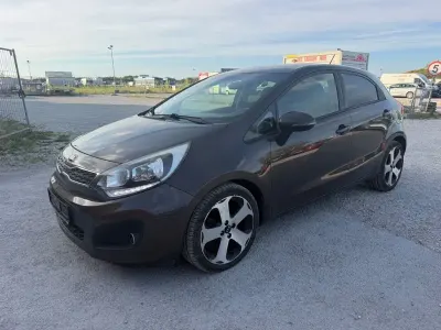 Gebraucht Kia Rio Platinum Edition 90 PS (66 kW) 2014 Braun Limousine