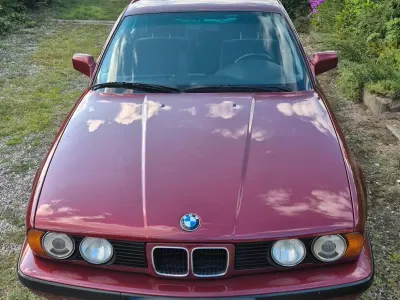 Gebraucht BMW 520 150 PS (110 kW) 1991 Rot Limousine