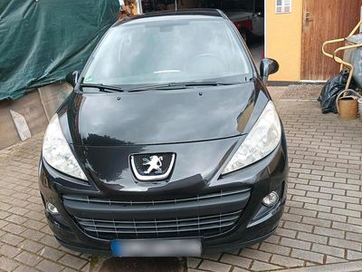 Gebraucht Peugeot 207 75 PS (55 kW) 2011 Schwarz Kleinwagen