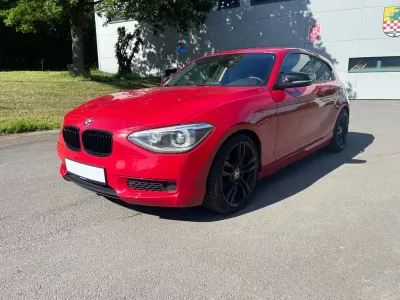 Gebraucht BMW 116 Urban Line 136 PS (100 kW) 2013 Rot Kleinwagen