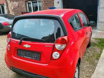 Używany Chevrolet Spark 75 KM (55 kW) 2013 Czerwony Hatchback