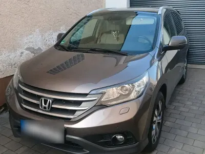 Käytetty Honda CR-V 155 HP (114 kW) 2013 Ruskea Katumaasturi