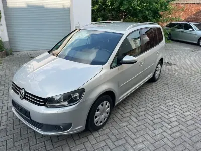 Gebraucht VW Touran Comfortline 105 PS (77 kW) 2011 Silber Van / Kleinbus