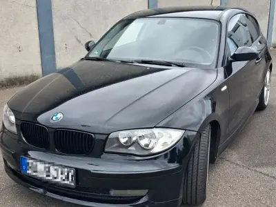 Gebraucht BMW 116 122 PS (89 kW) 2009 Schwarz Kleinwagen