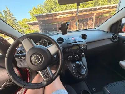 Gebraucht Mazda 2 Prime-Line 75 PS (55 kW) 2011 Rot Kleinwagen