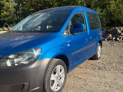Używany VW Caddy 75 KM (55 kW) 2014 Niebieski Minivan