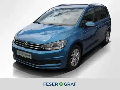 Gebraucht VW Touran Comfortline 150 PS (110 kW) 2023 Caribbean blue metallic Van / Kleinbus