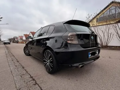 Używany BMW 116 122 KM (89 kW) 2009 Czarny Hatchback