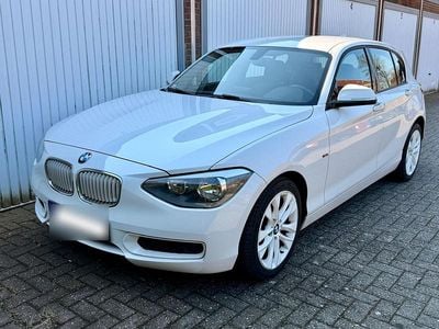 Second-hand BMW 116 Urban Line 136 CP (100 kW) 2011 Alb Hatchback