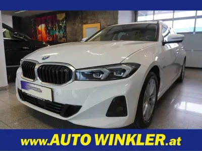 Gebraucht BMW 320e 204 PS (150 kW) 2022 Weiß Kombi