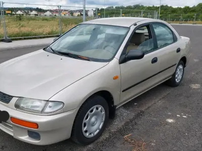 Gebraucht Mazda 323 Comfort 88 PS (64 kW) 1996 Beige Limousine