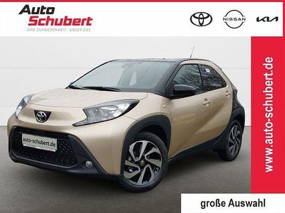 Ginger beige metallic/ night sky black Gebraucht 2025 Toyota Aygo X Basis SUV | 16.980 € (Fairer Preis)