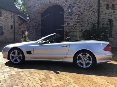 Second-hand Mercedes SL350 245 CP (180 kW) 2003 Argintiu Cabrio