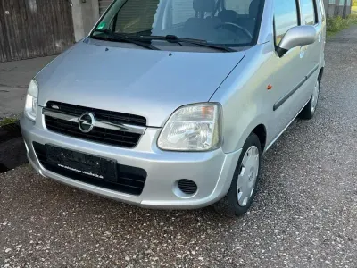 Używany Opel Agila 60 KM (44 kW) 2006 Srebrny Hatchback