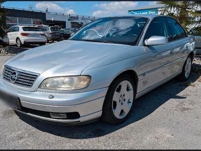 Second-hand Opel Omega 179 CP (131 kW) 2002 Argintiu Berlinǎ