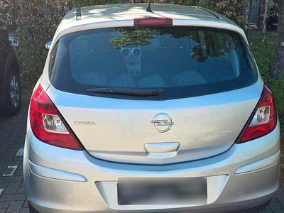 Second-hand Opel Corsa 74 CP (54 kW) 2012 Argintiu Hatchback