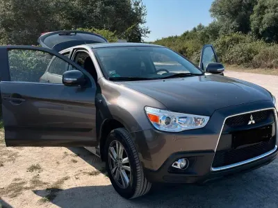 Używany Mitsubishi ASX Top 117 KM (86 kW) 2011 Brązowy SUV