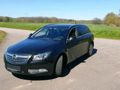 Używany Opel Insignia 132 KM (97 kW) 2010 Czarny Kombi