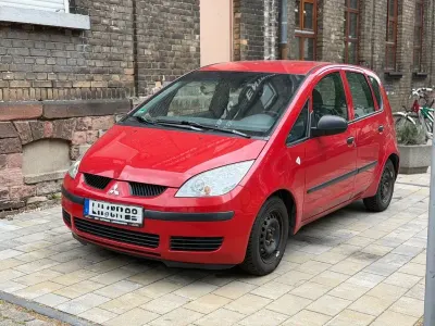 Gebraucht Mitsubishi Colt Invite 95 PS (69 kW) 2004 Rot Kleinwagen