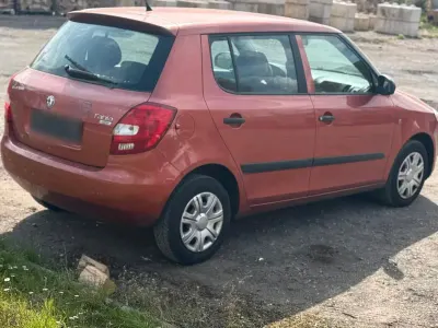 Second-hand Skoda Fabia 60 CP (44 kW) 2009 Portocaliu Berlinǎ