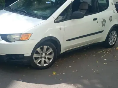 Gebraucht Mitsubishi Colt 75 PS (55 kW) 2010 Gelb Kleinwagen