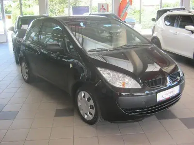 Gebraucht Mitsubishi Colt Inform 95 PS (69 kW) 2006 Cosmos schwarz Limousine