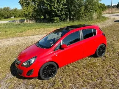Gebraucht Opel Corsa Color Edition 101 PS (74 kW) 2012 Rot Kleinwagen