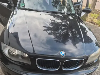 Gebraucht BMW 116 122 PS (89 kW) 2007 Schwarz Kleinwagen