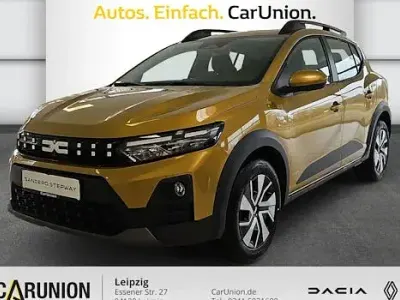 Neu Dacia Sandero Expression 110 PS (80 kW) 2026 Amber yellow Limousine
