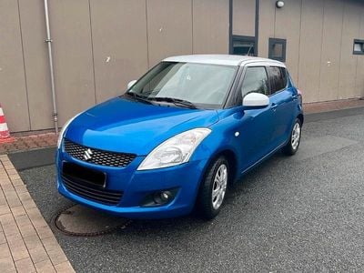Gebraucht Suzuki Swift 92 PS (67 kW) 2013 Blau Kleinwagen
