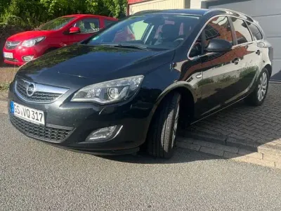 Używany Opel Astra Eco 110 KM (80 kW) 2012 Czarny Kombi