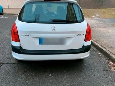 Gebraucht Peugeot 308 105 PS (77 kW) 2012 Weiß Kombi