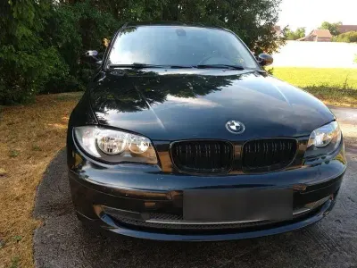 Gebraucht BMW 116 122 PS (89 kW) 2009 Schwarz Kleinwagen