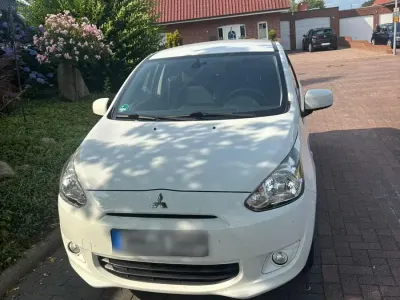 Gebraucht Mitsubishi Space Star 80 PS (58 kW) 2015 Weiß Kleinwagen