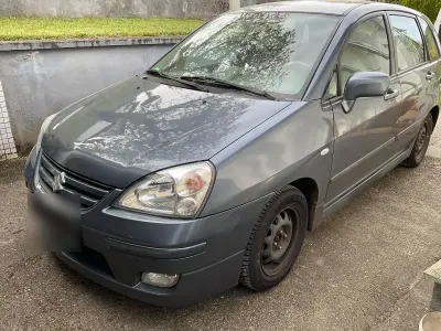 Usata Suzuki Baleno 101 CV (74 kW) 2005 Grigio Berlina