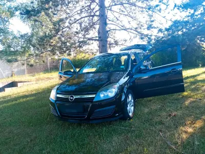 Gebraucht Opel Astra 125 PS (91 kW) 2005 Schwarz Kombi