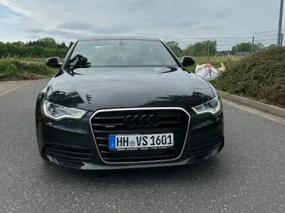 Używany Audi A6 Sport 180 KM (132 kW) 2012 Czarny Sedan/Limuzyna