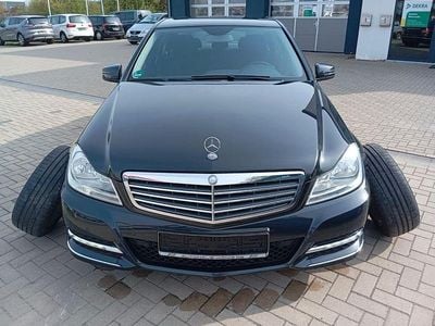 Używany Mercedes C180 156 KM (114 kW) 2013 Czarny Sedan/Limuzyna