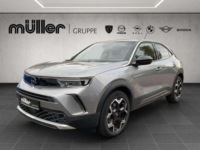 Gebraucht Opel Mokka-e Ultimate 100 kW (136 PS) 2022 Quarz silber SUV