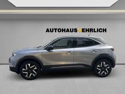 Gebraucht Opel Mokka Elegance 131 PS (96 kW) 2023 Kontrast grau/quarz silber SUV