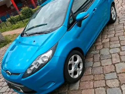 Używany Ford Fiesta 82 KM (60 kW) 2012 Niebieski Hatchback