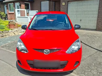 Gebraucht Mazda 2 55 PS (40 kW) 2010 Rot Kleinwagen
