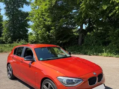 Gebraucht BMW 116 Sport Line 116 PS (85 kW) 2012 Orange Kleinwagen