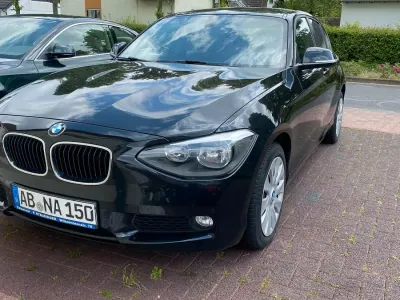 Käytetty BMW 116 143 HP (105 kW) 2013 Musta Viistoperä