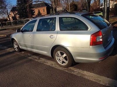 Second-hand Skoda Octavia 105 CP (77 kW) 2013 Argintiu Break